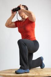 ANGELINA KNEELING POSE WITH SPYGLASS